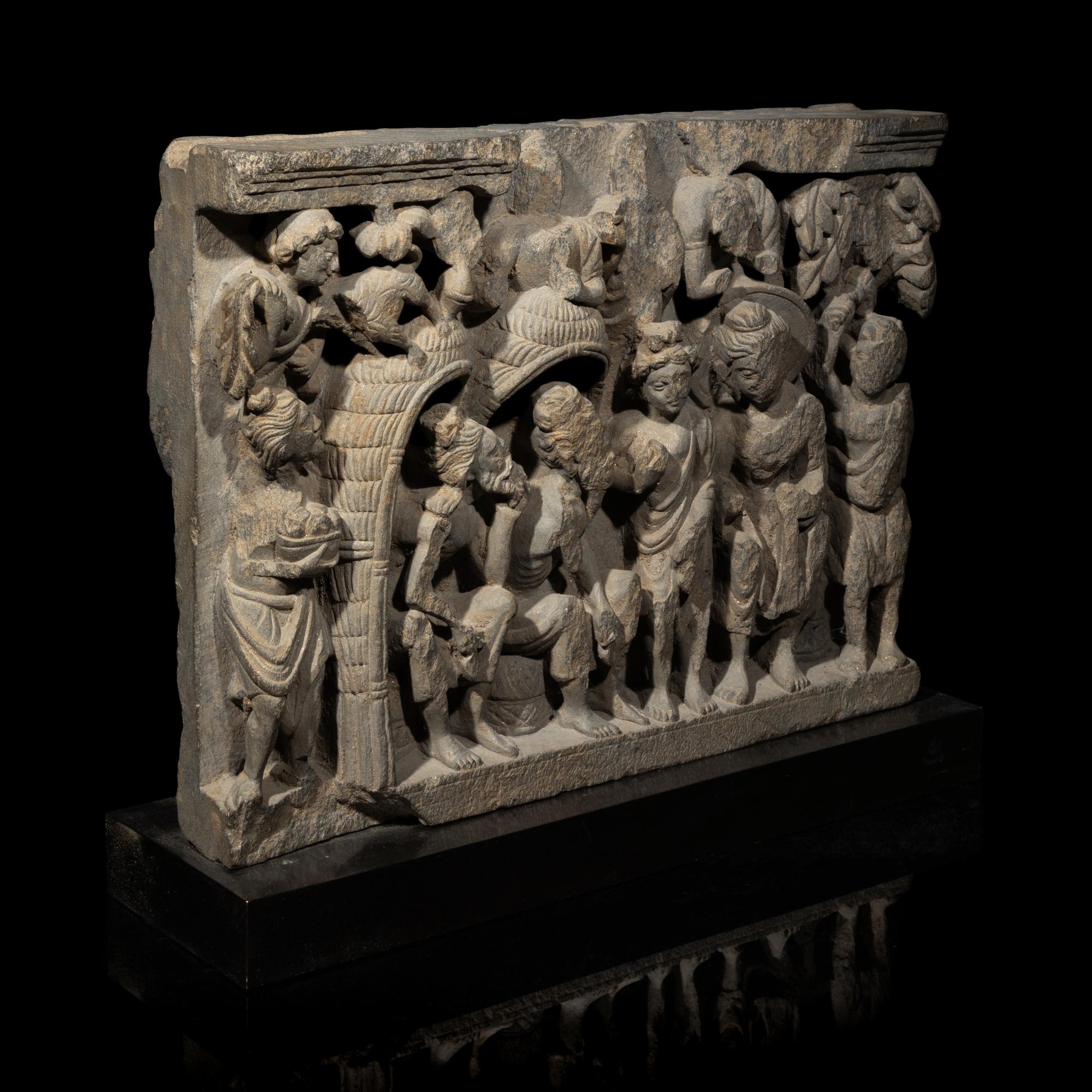 A Gandharan Grey Schist Relief Depicting Buddha Visiting Kashyapa, 2nd/3rd Century