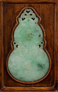 An Apple Green and Pale Celadon Jadeite Inset Hardwood Table Screen