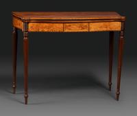 A Federal Birch Veneered and Inlaid Mahogany Serpentine-Top Games Table