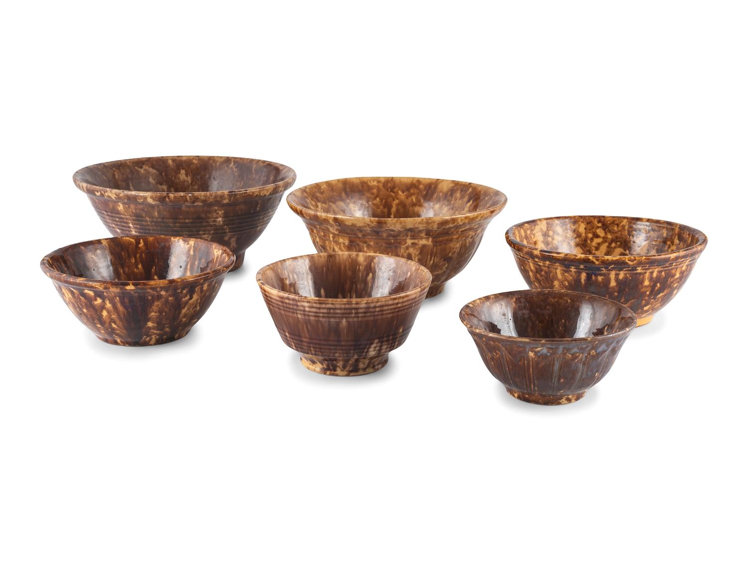 Eight Rockingham Glaze Bowls