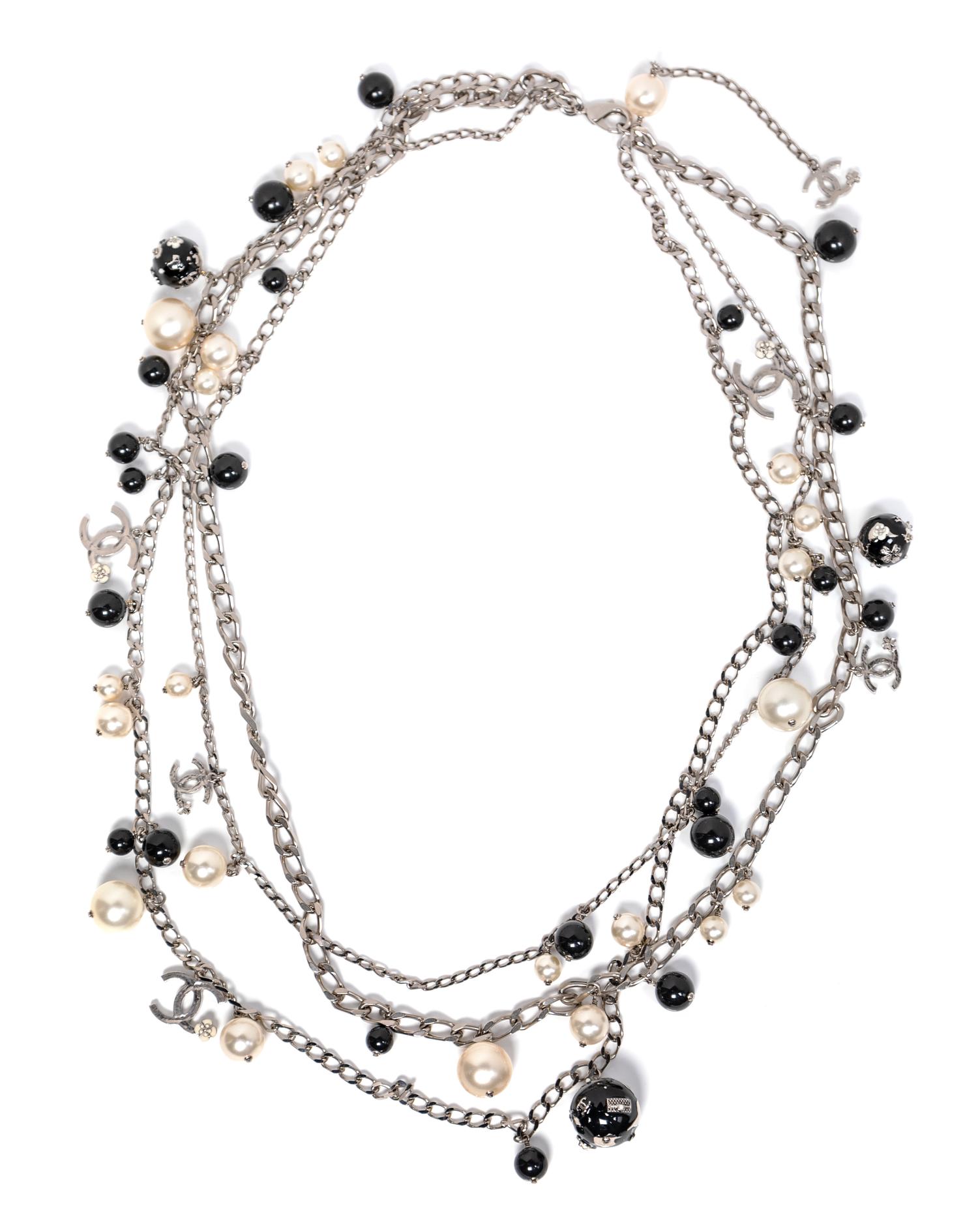 Chanel Multi-Strand Globe and CC Charm Necklace or Belt, 2013 Length: 20"