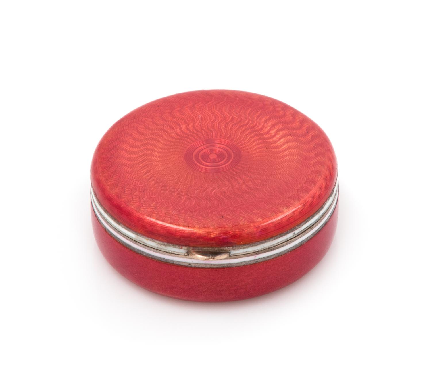 A Russian Silver and Guilloche Enamel Snuff Box, Mark of Ivan Bednyakov, St. Petersburg, 19th Century, of circular form.