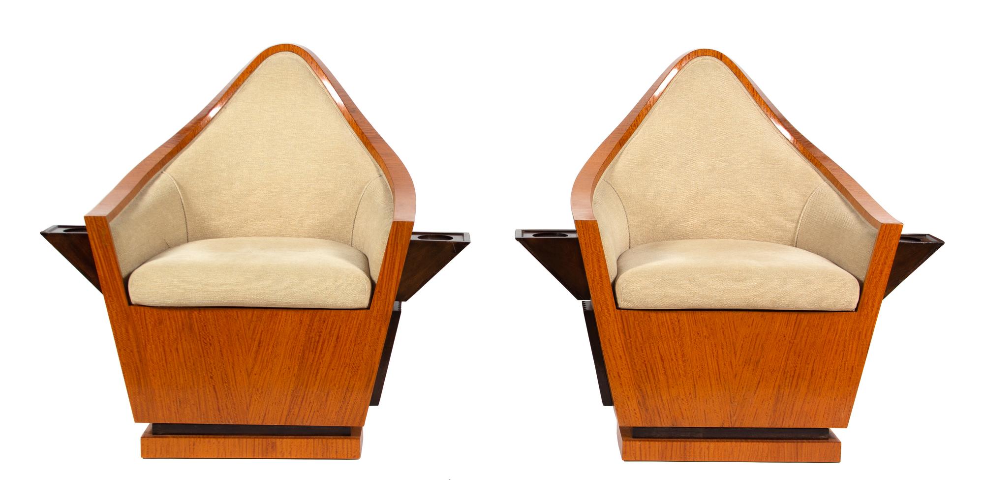 A Pair of Art Deco Birch Veneer Swivel Club Chairs Height 38 x width 40 1/2 inches. — EARLY 20TH CENTURY