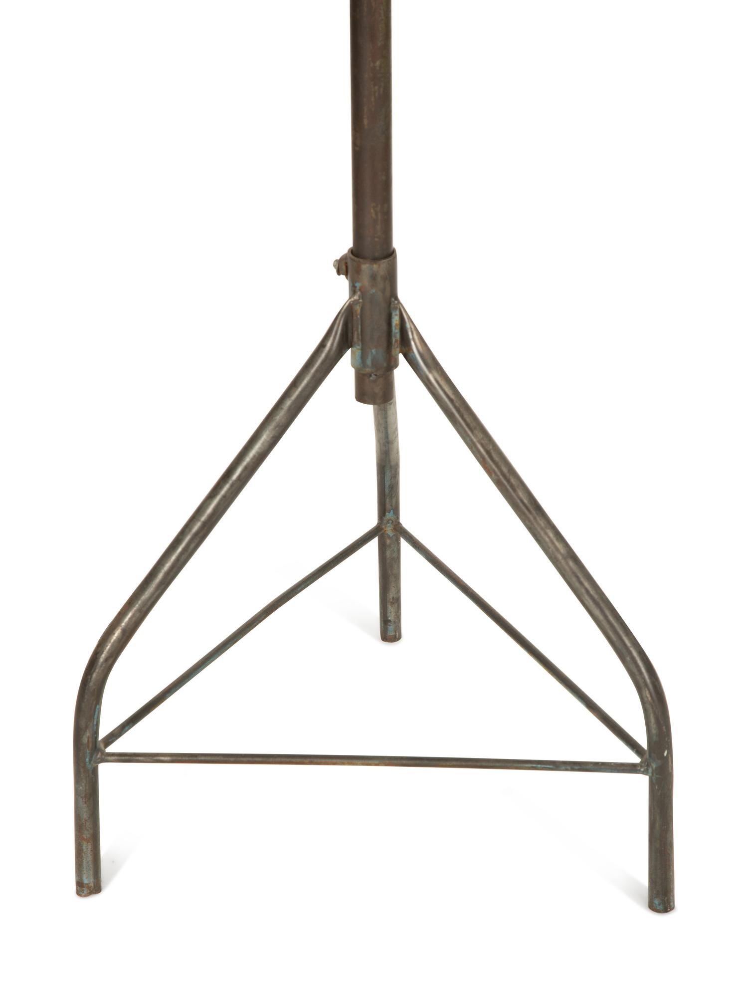 A Steel Tripod Base Articulated Floor Lamp