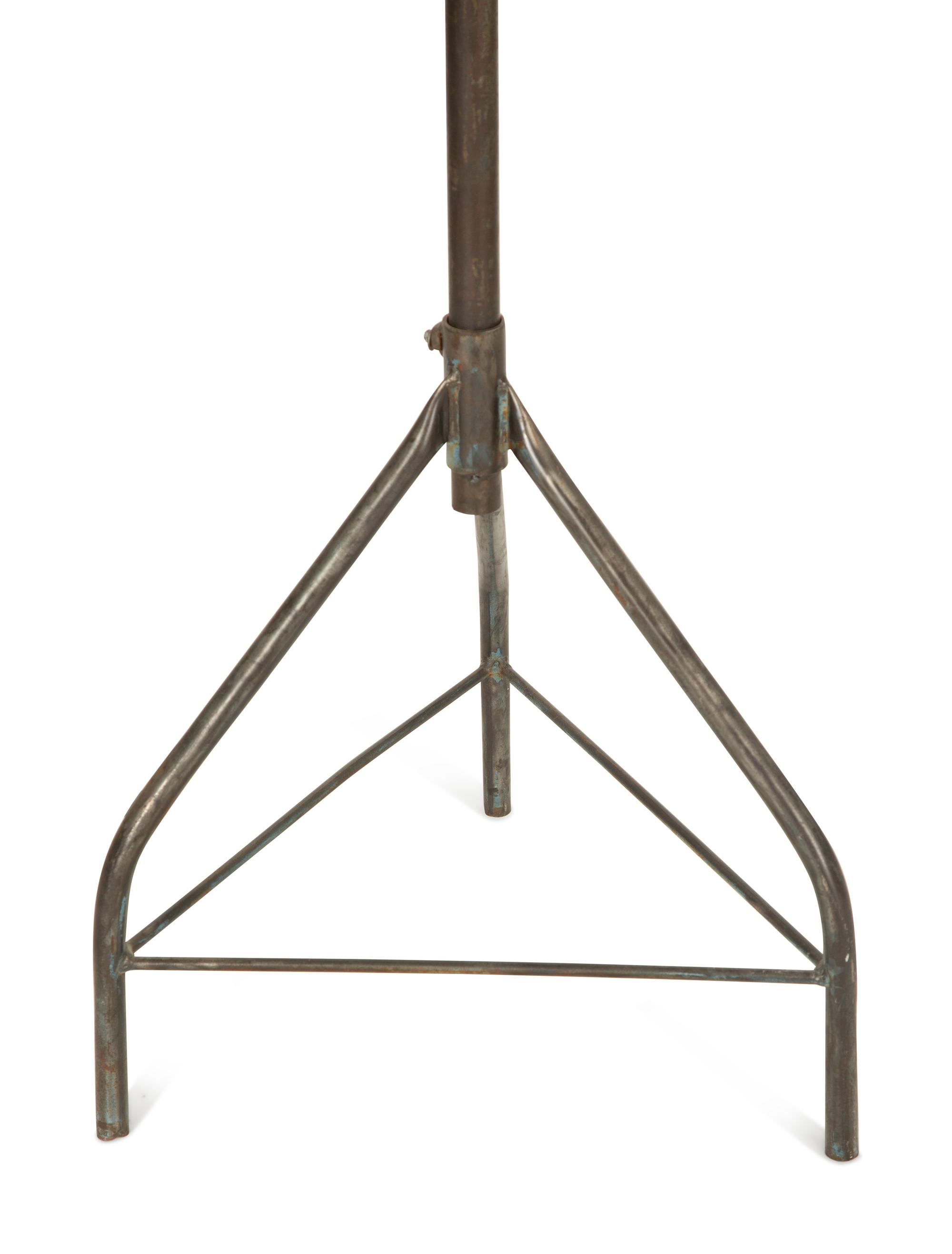 A Steel Tripod Base Articulated Floor Lamp