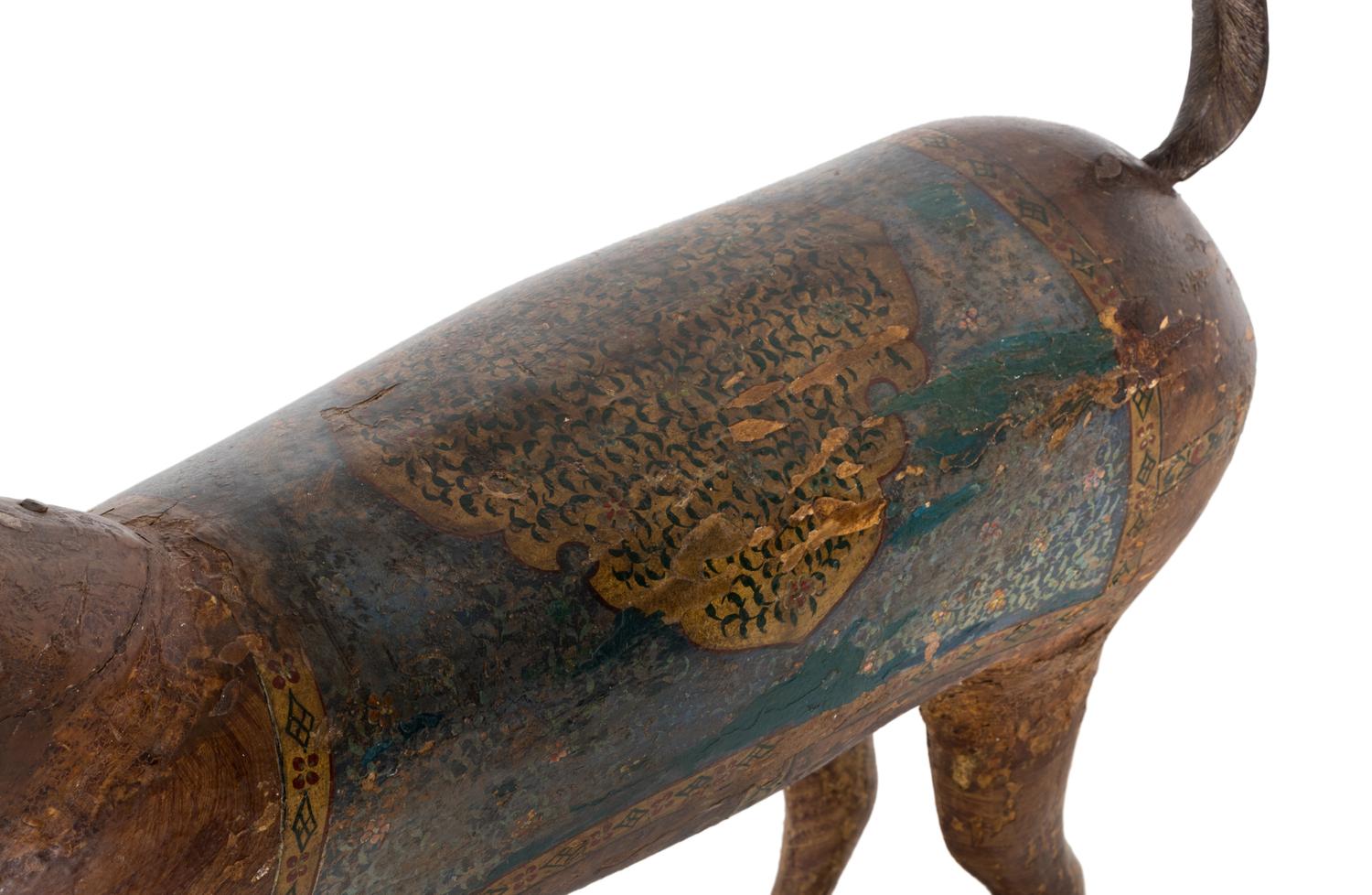 A Pair of Indian Painted Wood Models of Deer