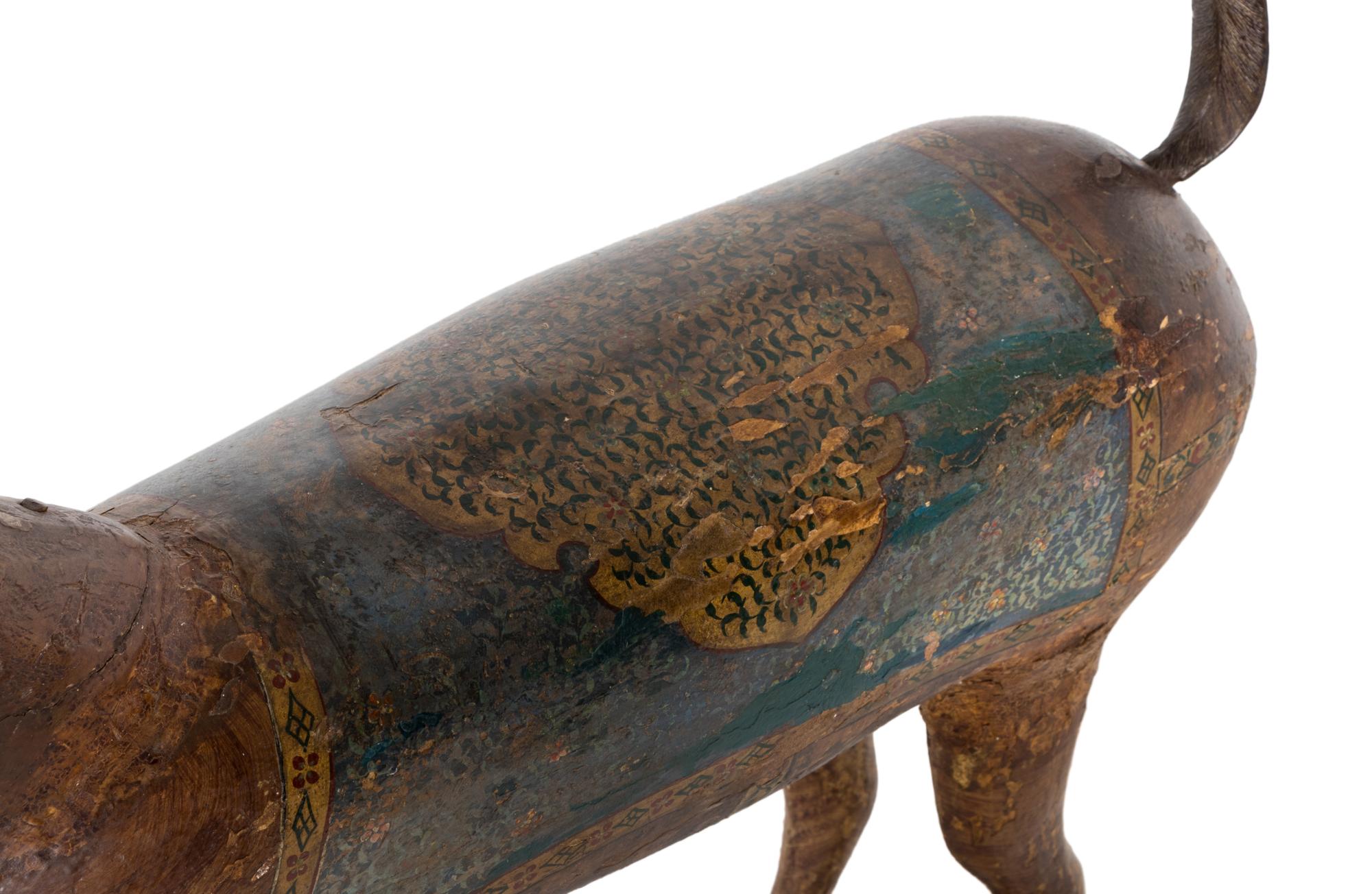 A Pair of Indian Painted Wood Models of Deer