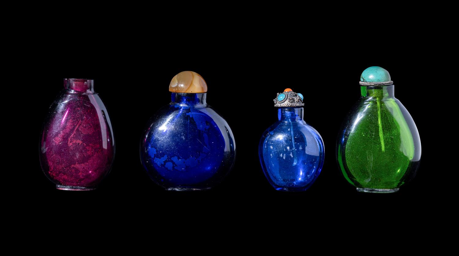 Four Chinese Transparent Glass Snuff Bottles