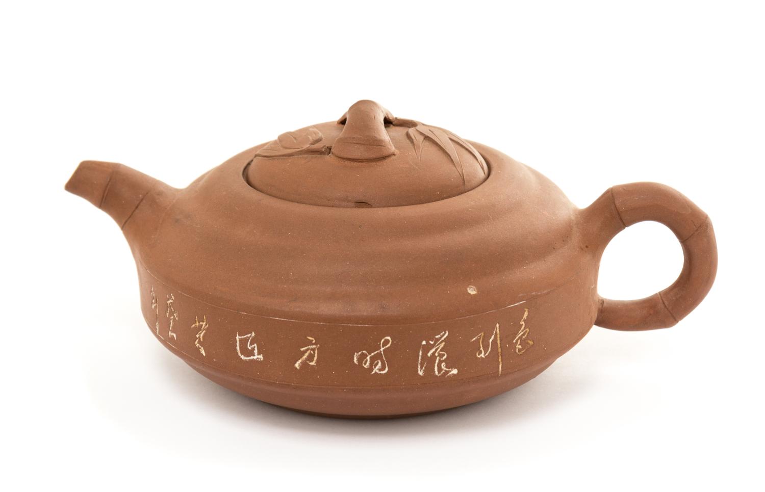 A Yixing Pottery Teapot Height 3 inches.