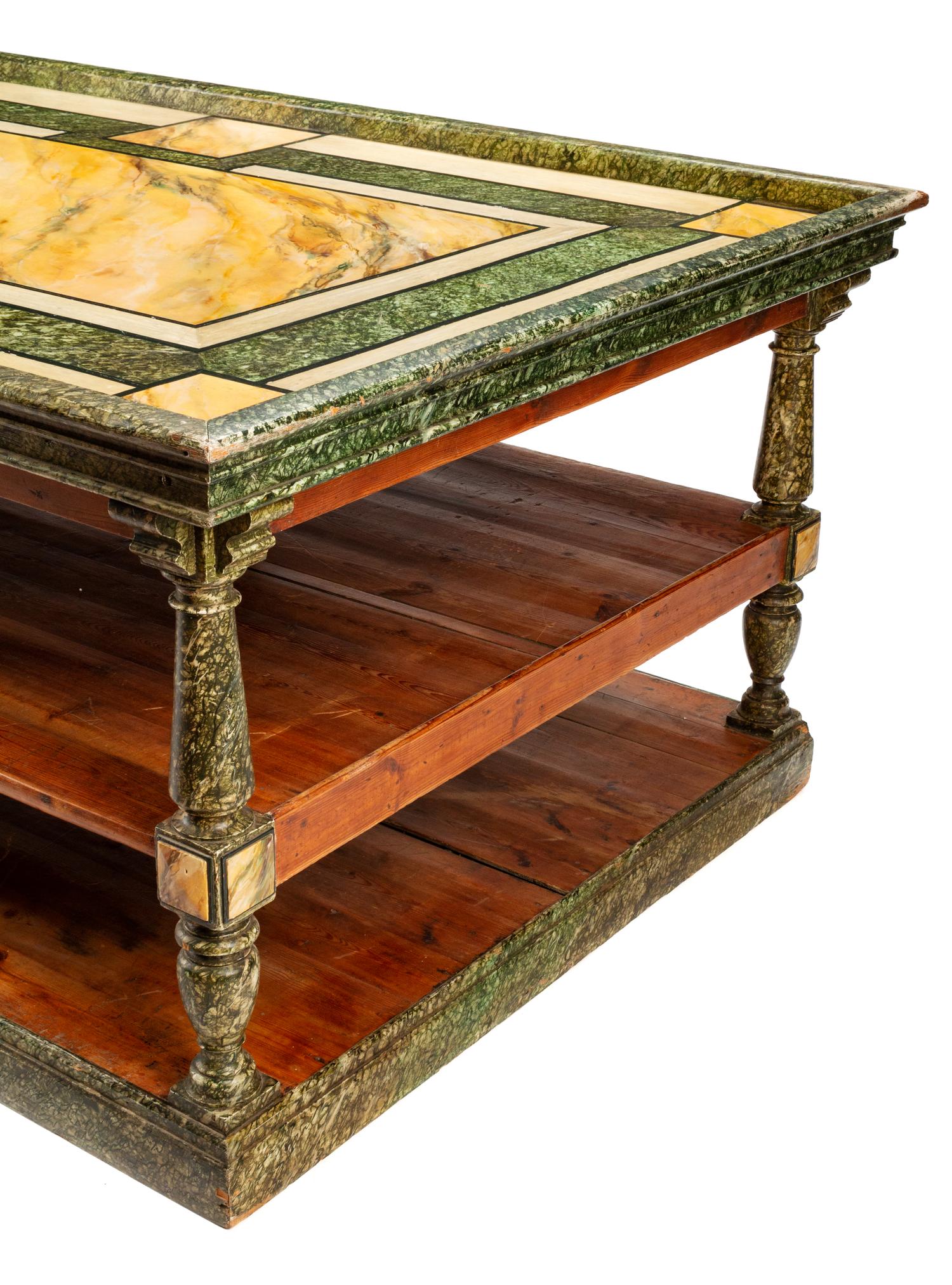 A Continental Faux Marble Painted Three-Tier Portfolio Table