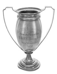 An American Silver Trophy, Maker's Mark RS Co., Early 20th Century, of twin handled form, the body, handles, and circular foot having s
