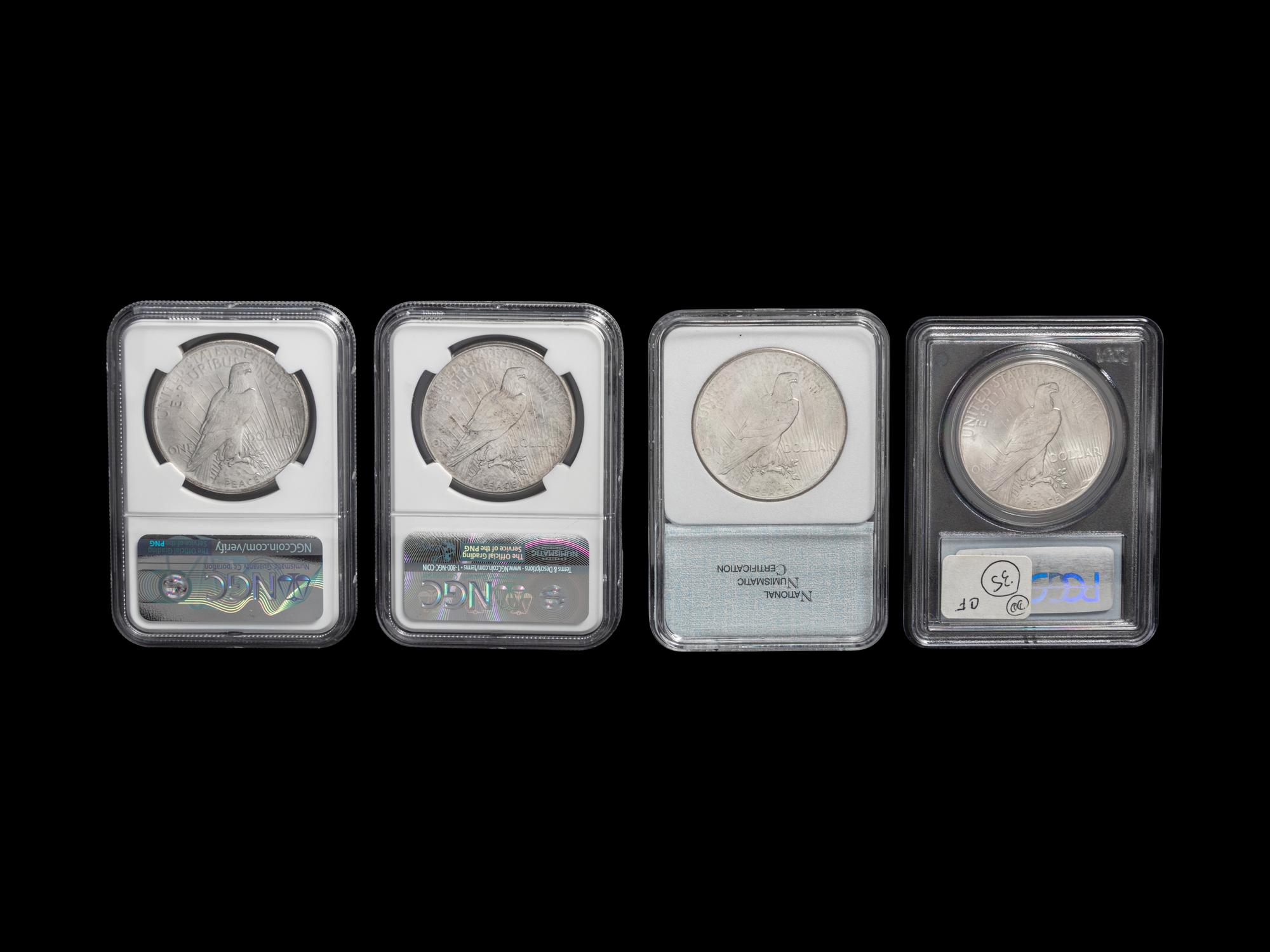 Four 1925 Peace $1 Coins