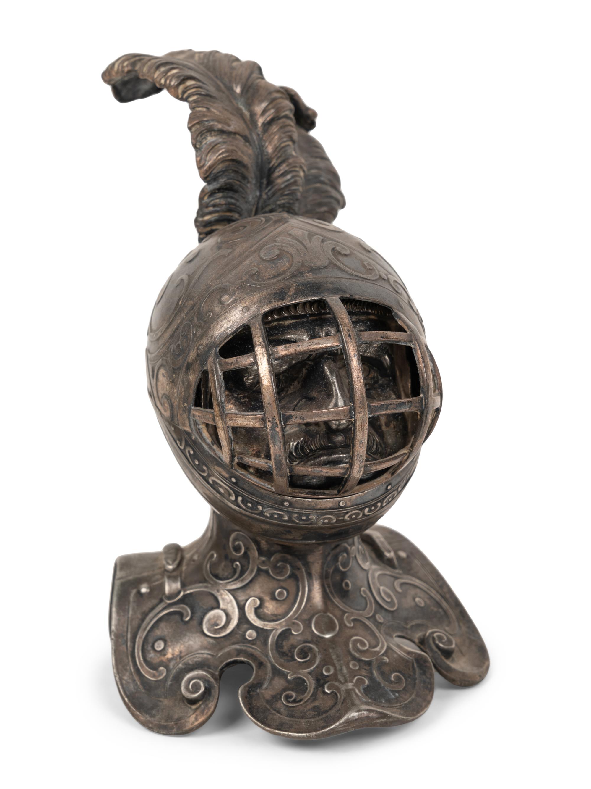 Two Knight Inkwells and a Helmet Inkwell