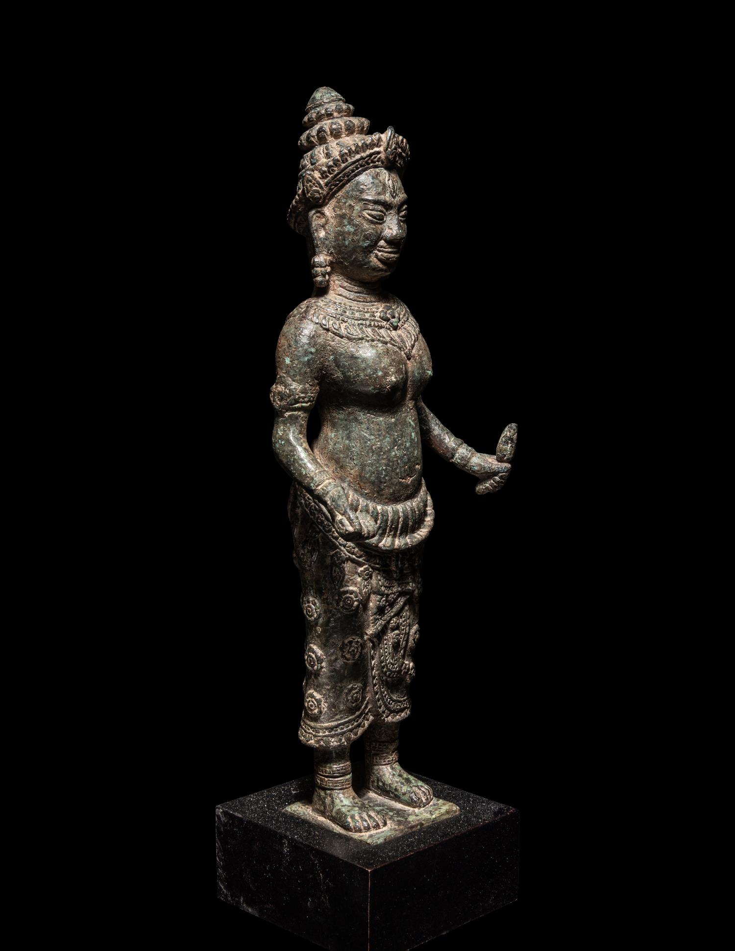 A Khmer Bronze Figure of a Deity