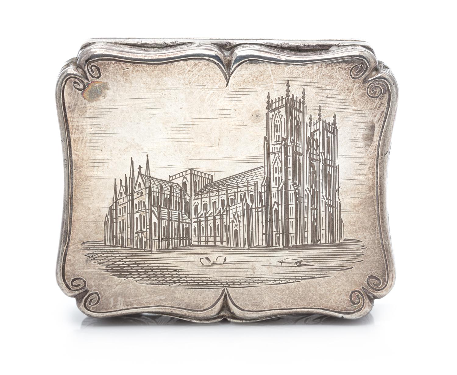 A Victorian Silver Vinaigrette, Edward Smith, Birmingham, 1843, the lid worked to depict a cathedral.