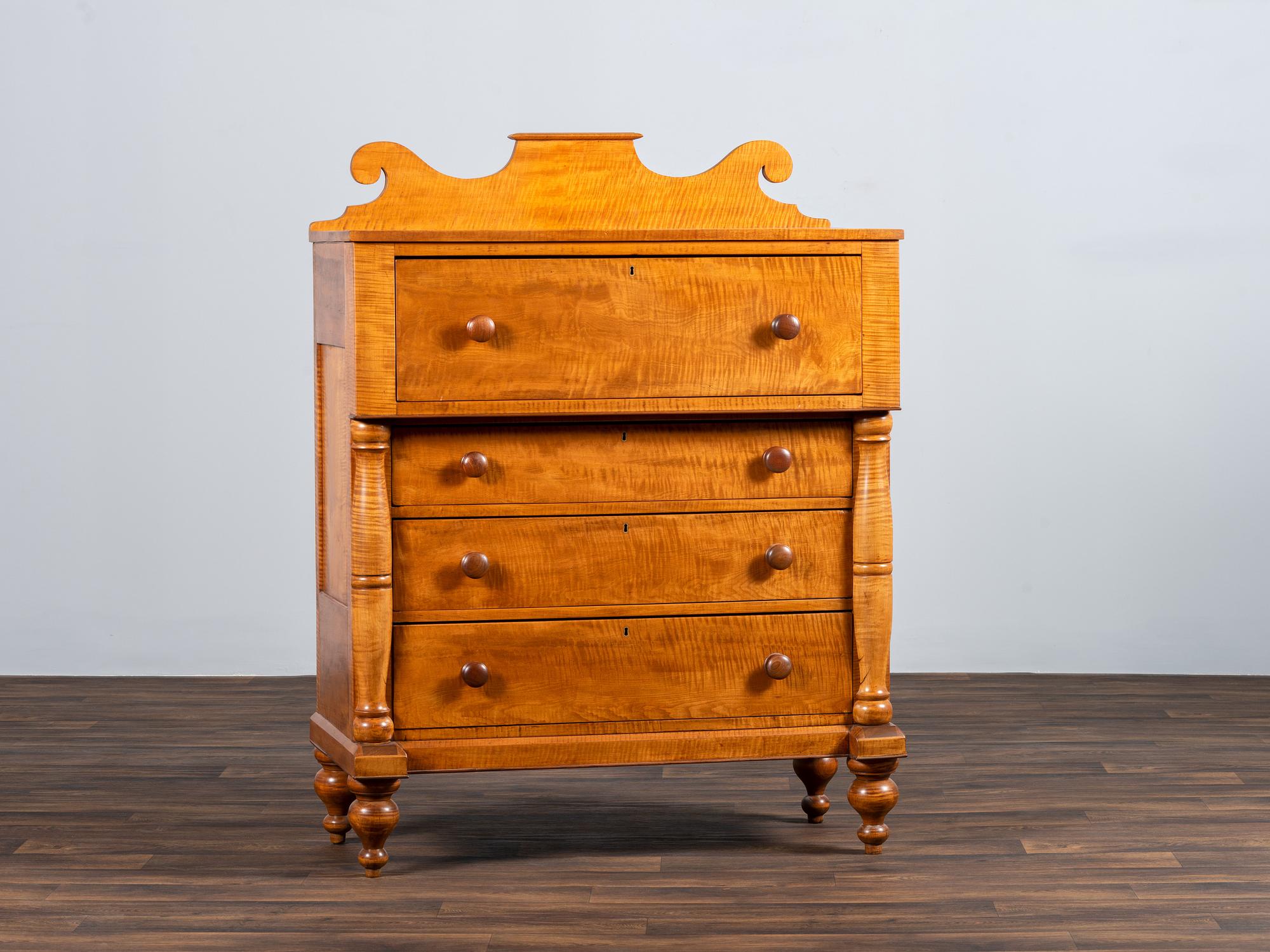 A Late Federal Tiger Maple Chest of Drawers
