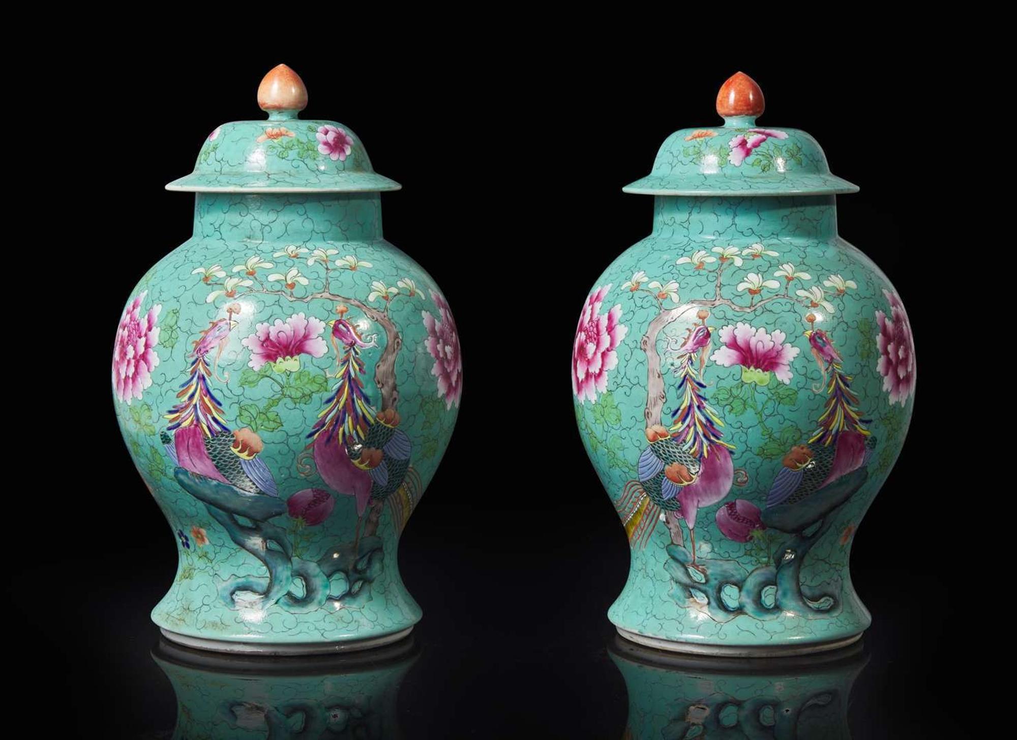 A pair of Chinese turquoise ground jars and covers 松石綠地蓋罐一對