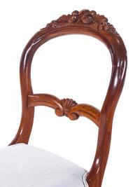 A Pair of Victorian Carved Walnut Side Chairs