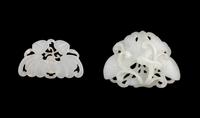 Two Chinese Carved Pale Celadon Jade Pendants