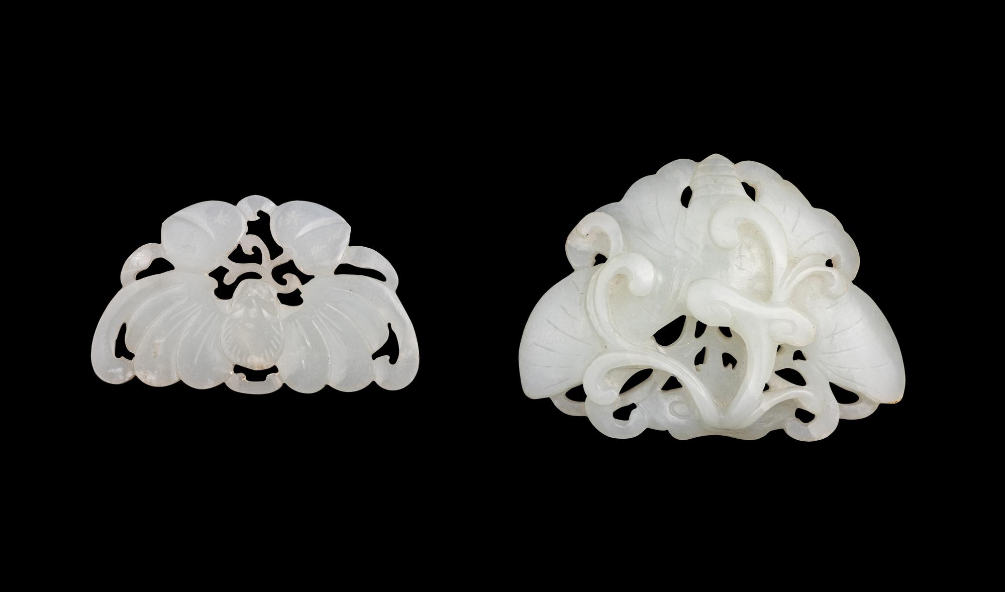 Two Chinese Carved Pale Celadon Jade Pendants