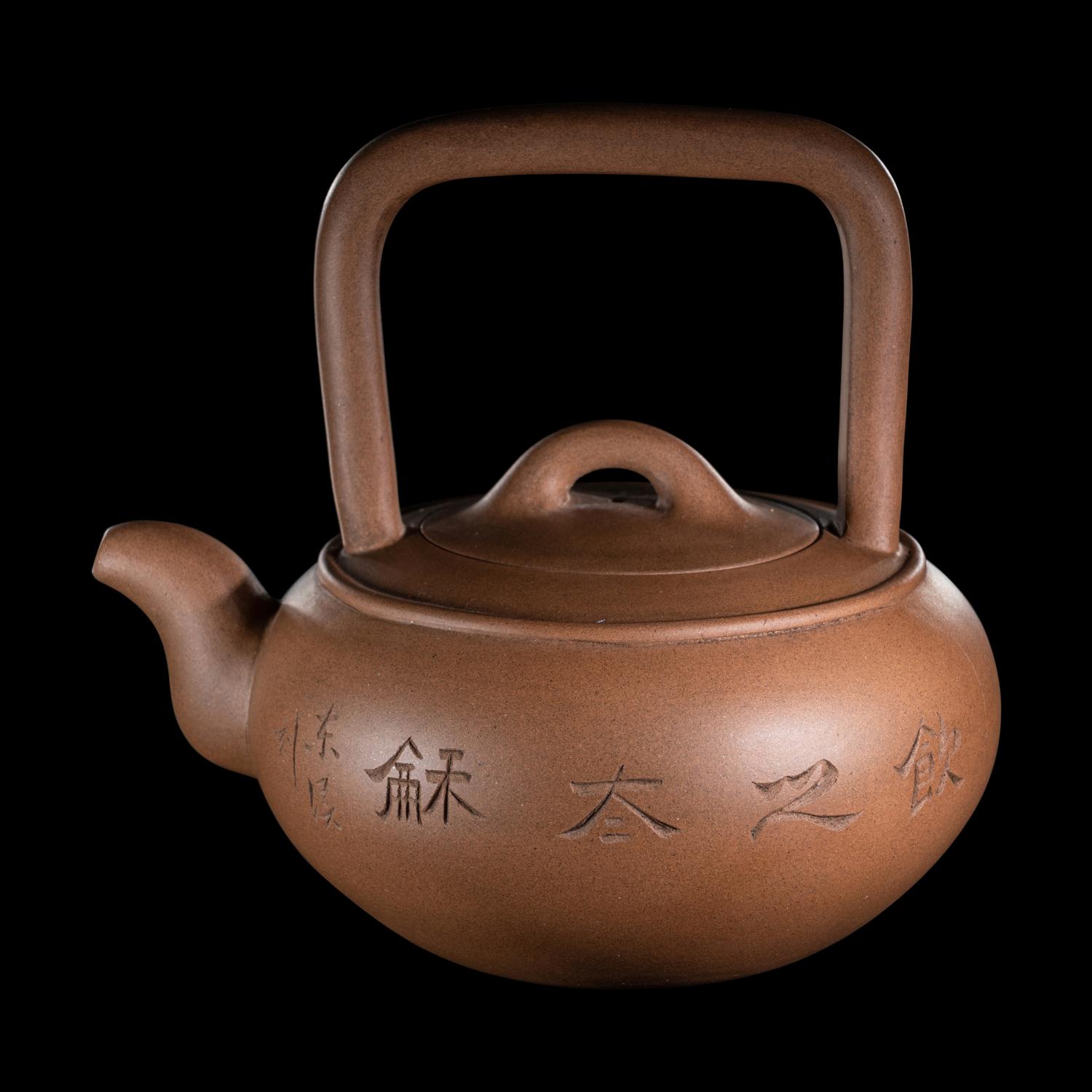 A Chinese Yixing Zisha Pottery Teapot