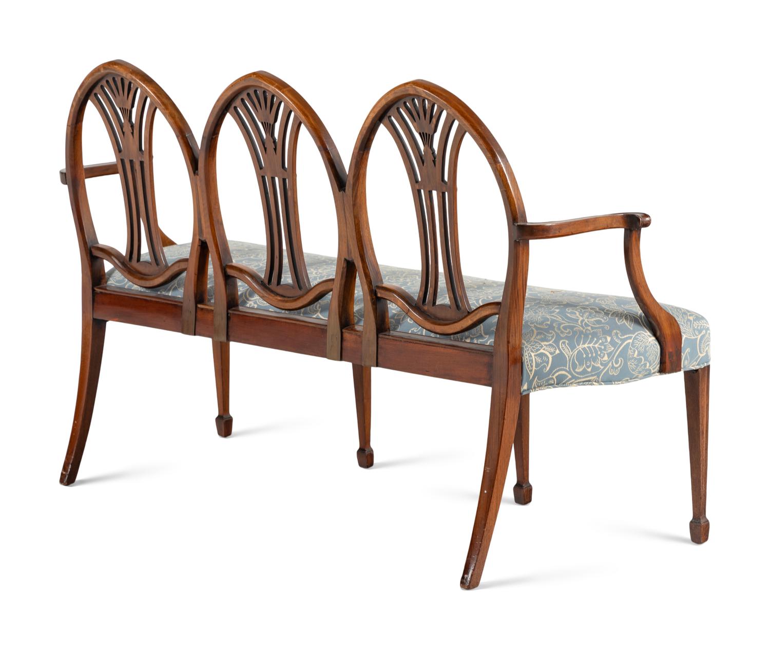 A George III Mahogany Triple-Back Settee