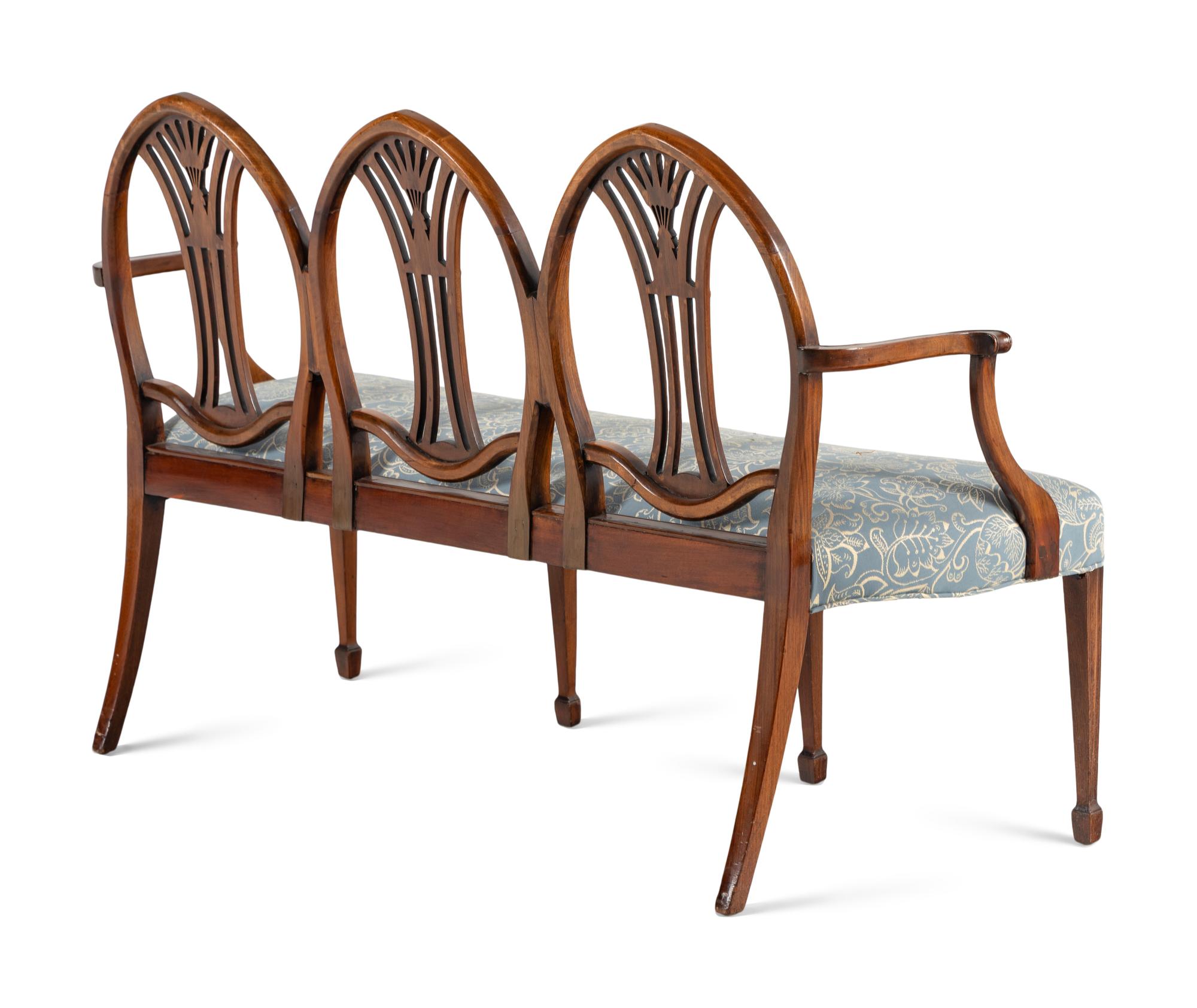 A George III Mahogany Triple-Back Settee