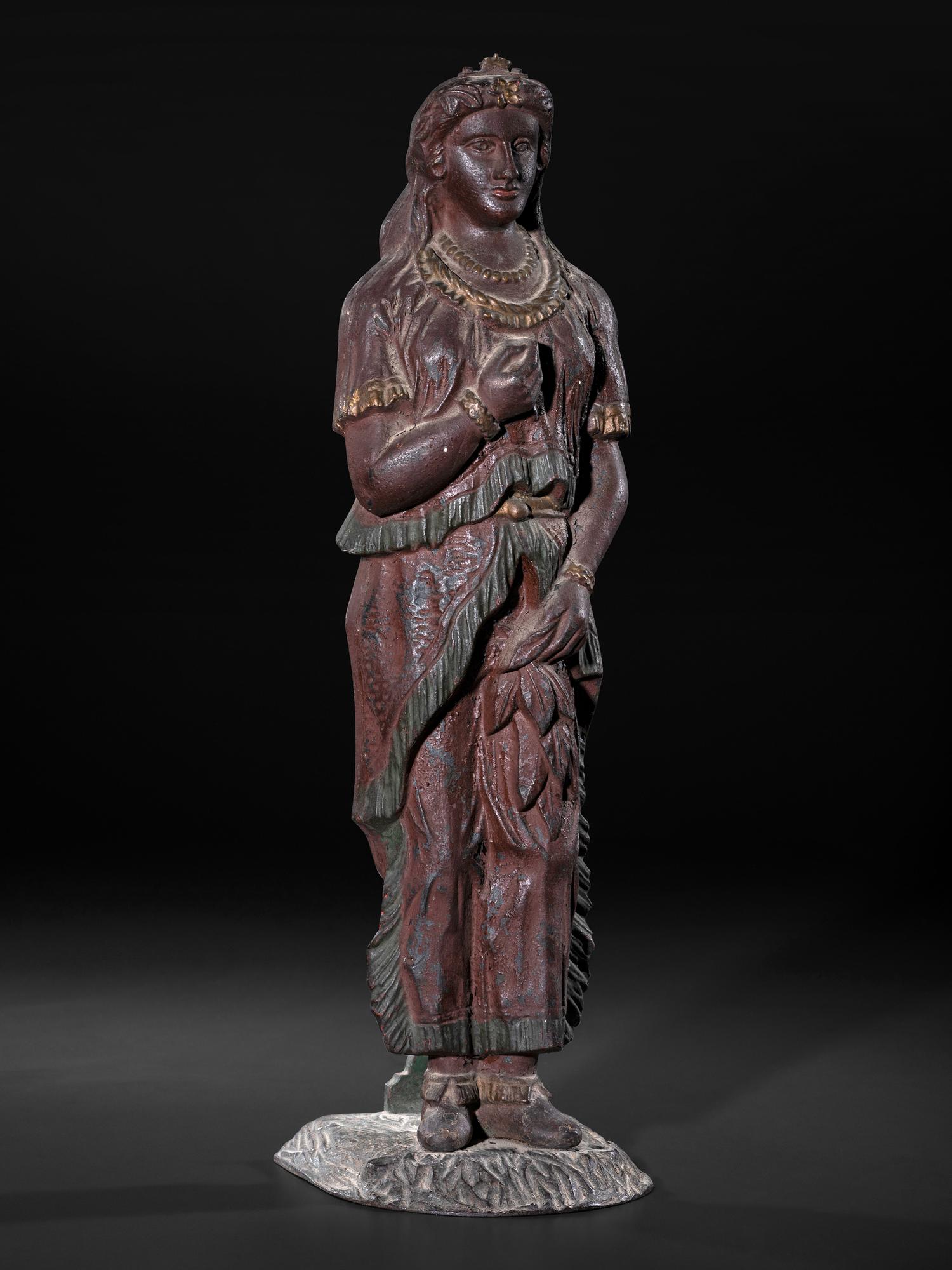 A Painted Cast Iron Tobacco Trade Figure of Native American Woman