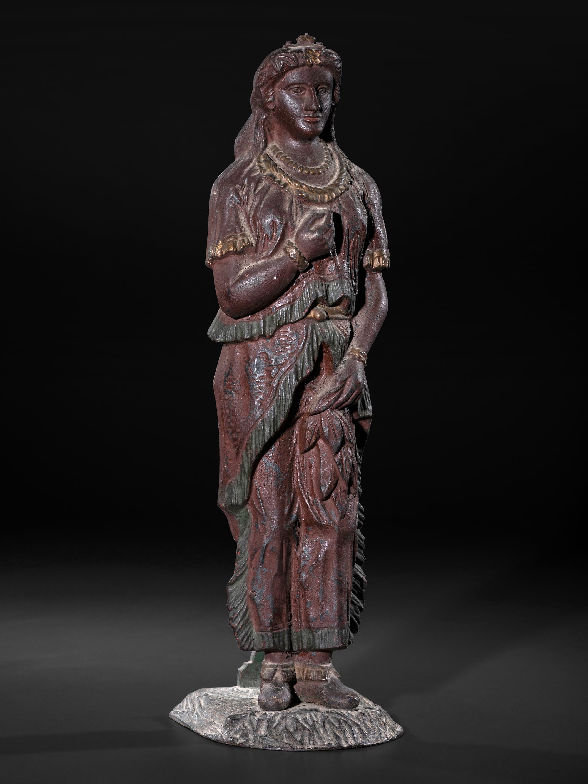 A Painted Cast Iron Tobacco Trade Figure of Native American Woman