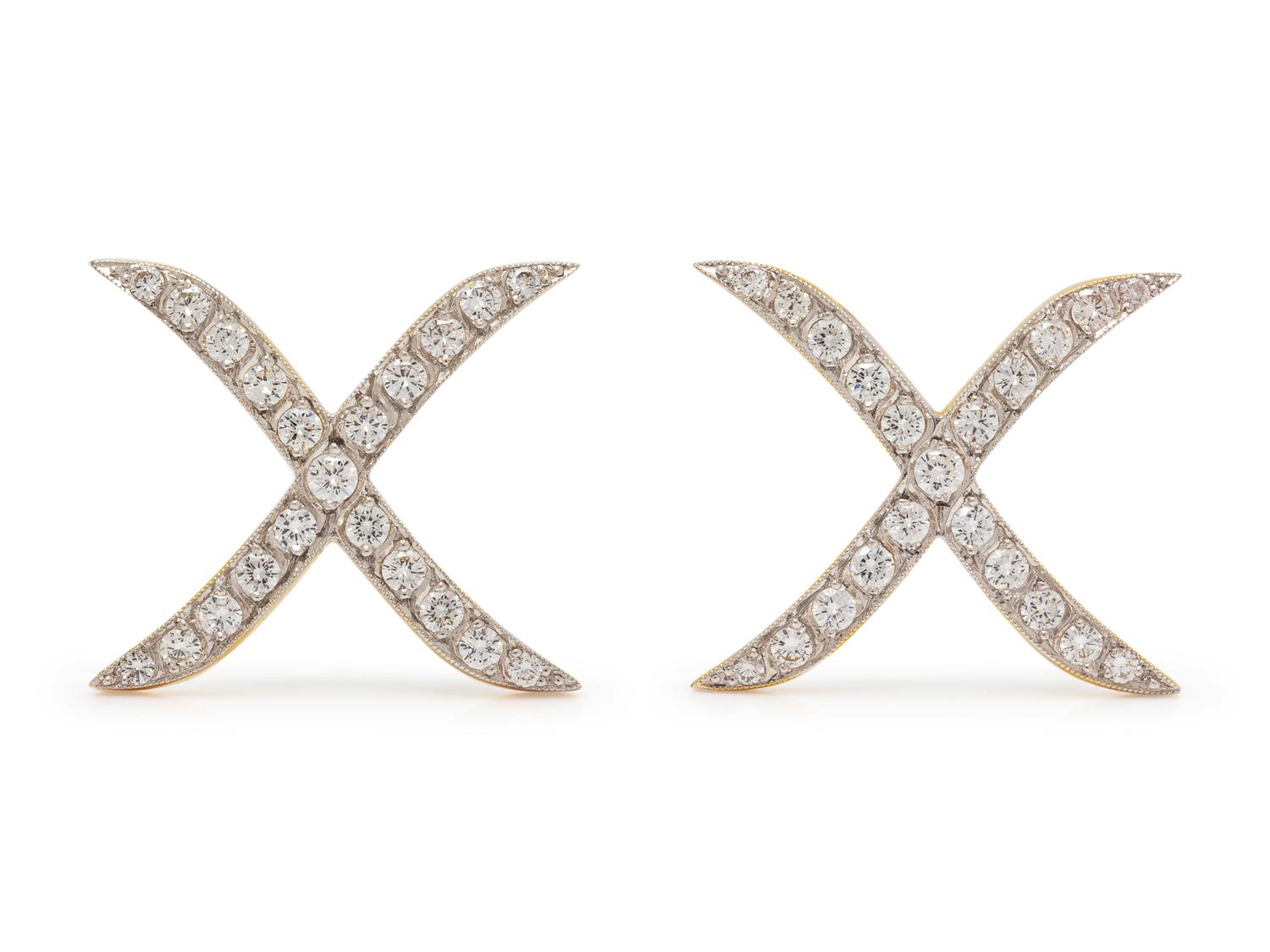 A Pair of 18 Karat Bicolor Gold and Diamond Brooches,
