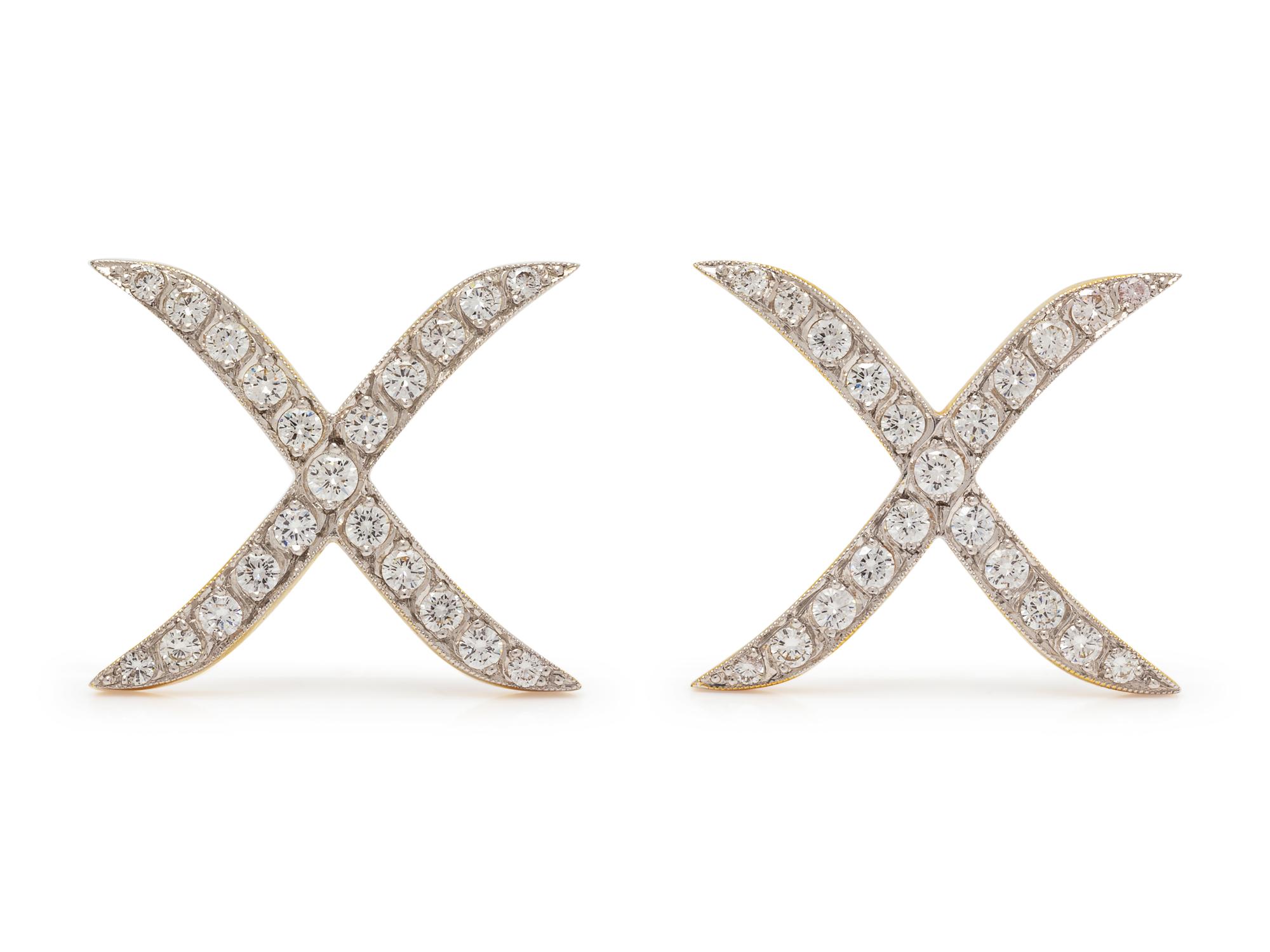 A Pair of 18 Karat Bicolor Gold and Diamond Brooches,