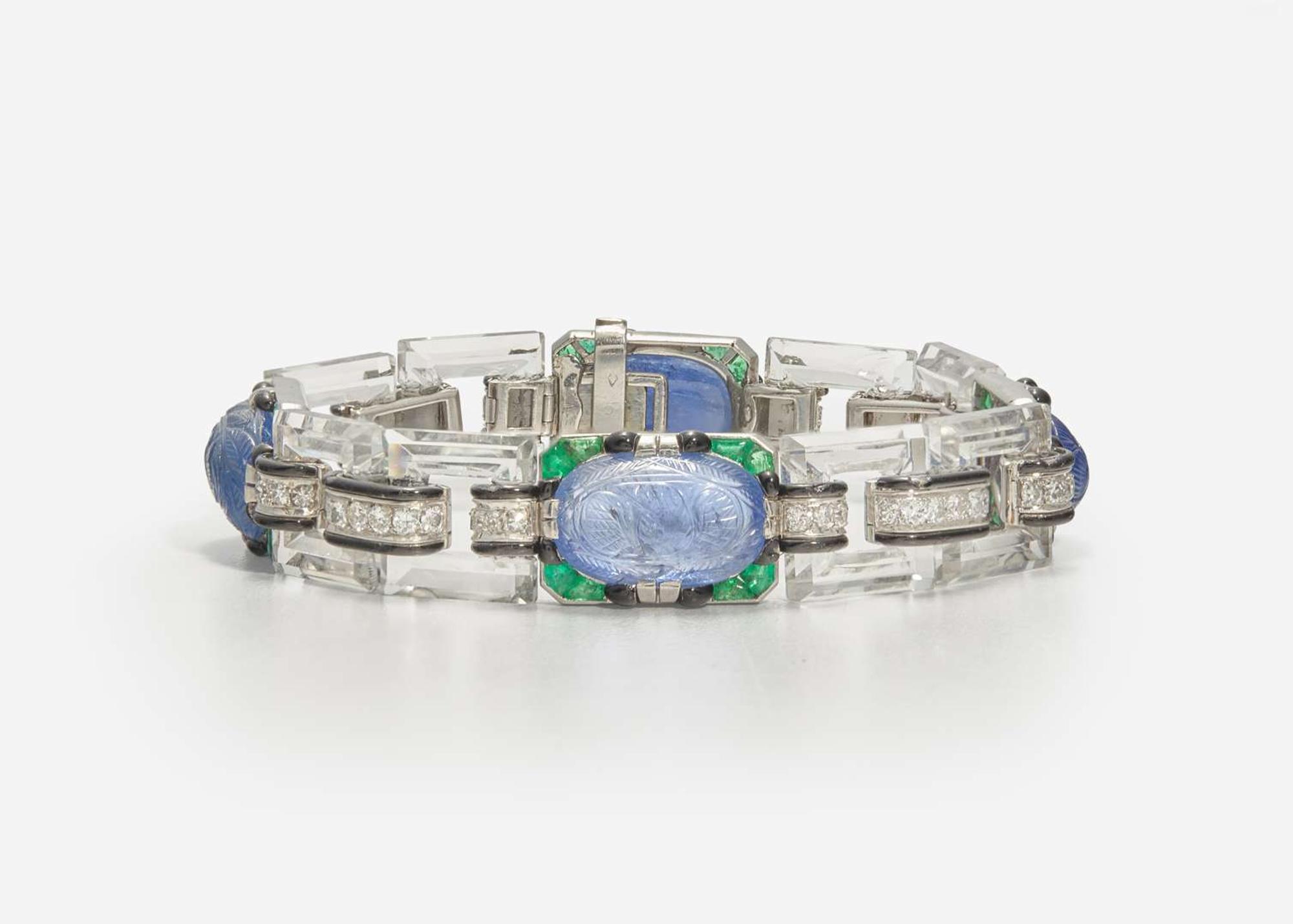 An 18K White Gold, Sapphire, Emerald, Diamond, and Enamel Art Deco Bracelet