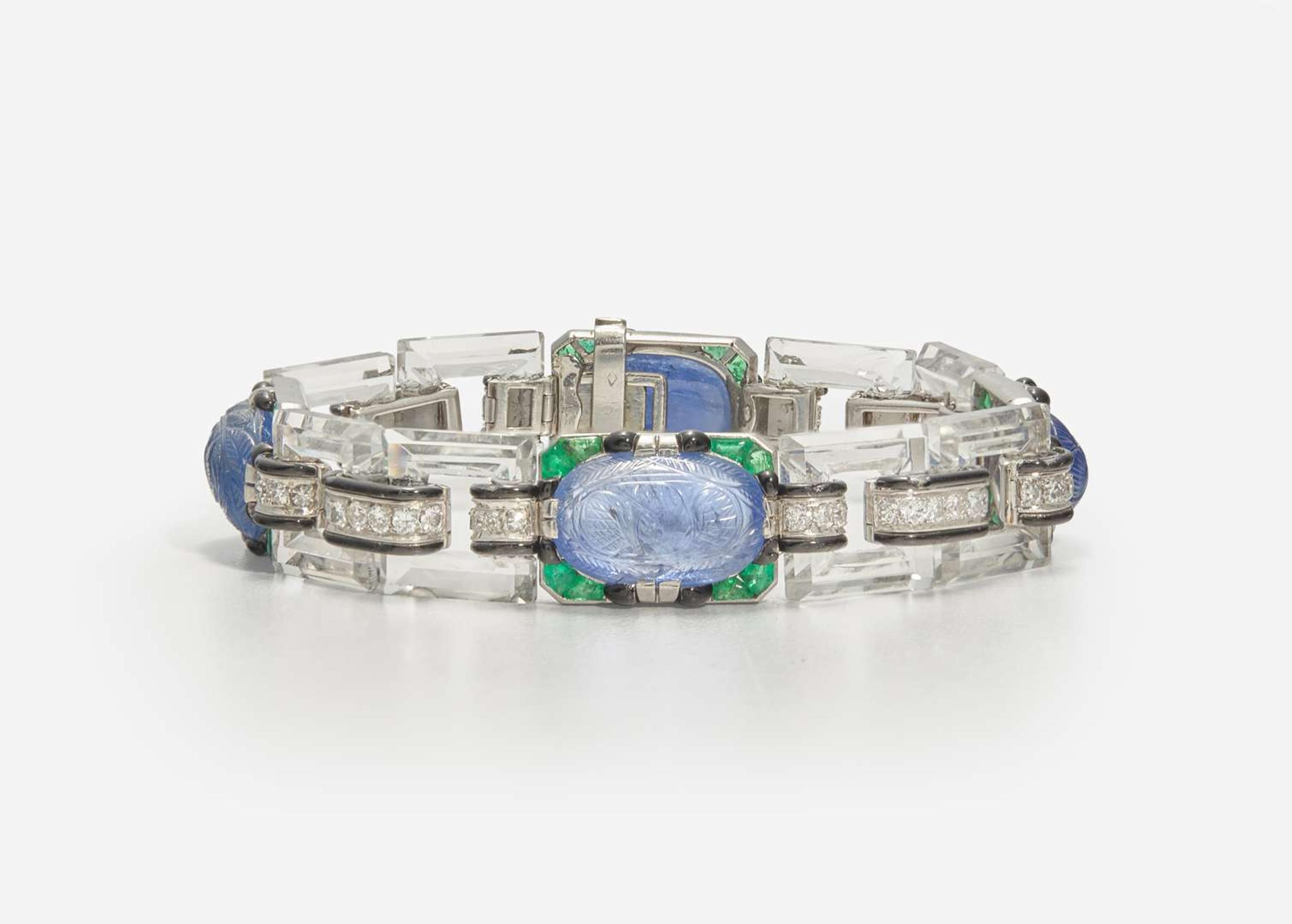 An 18K White Gold, Sapphire, Emerald, Diamond, and Enamel Art Deco Bracelet