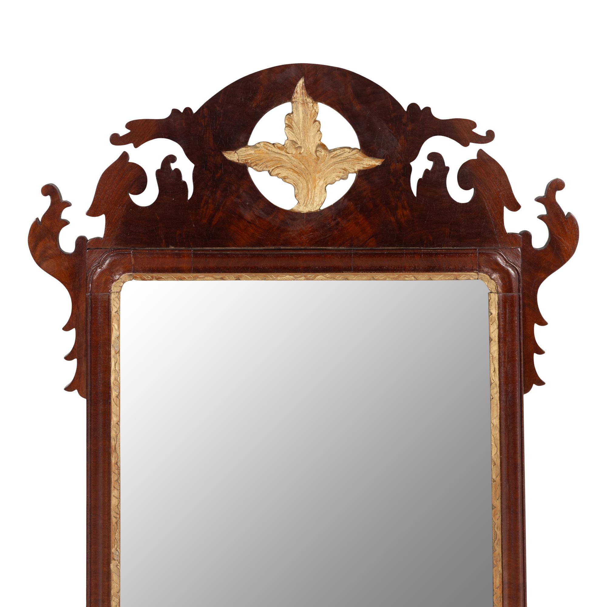 A Chippendale Parcel-Gilt Mahogany Mirror