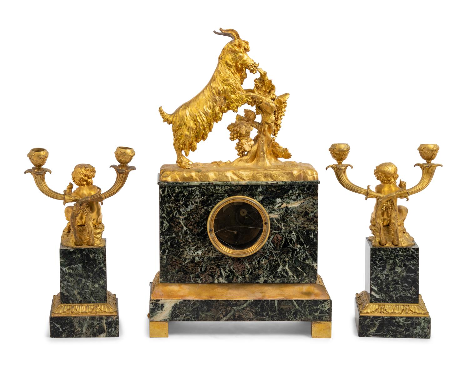 An Assembled Louis Philippe Marble and Gilt Bronze Figural Garniture