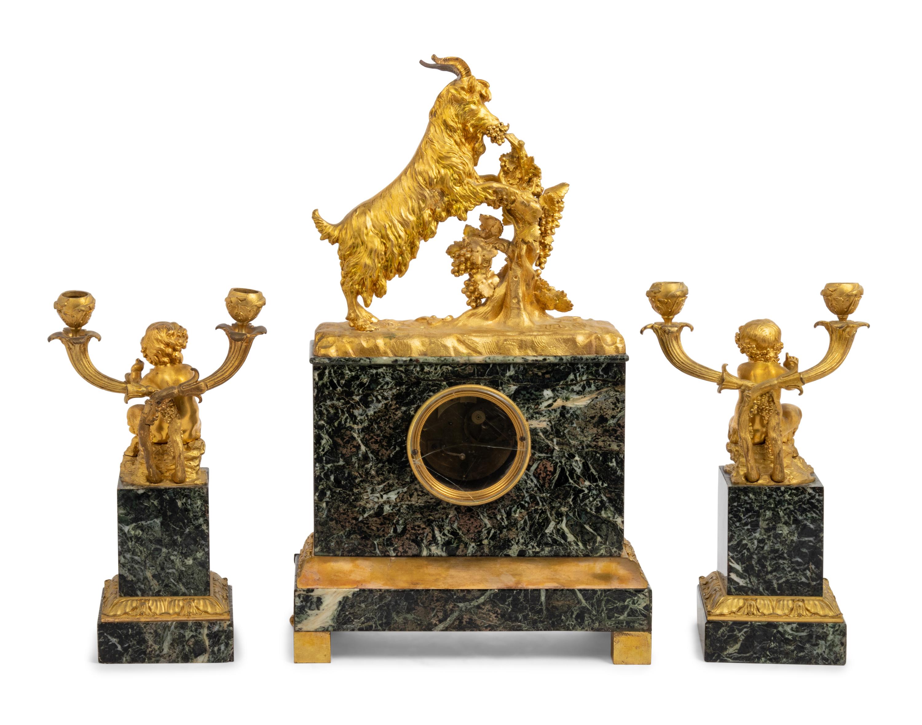 An Assembled Louis Philippe Marble and Gilt Bronze Figural Garniture