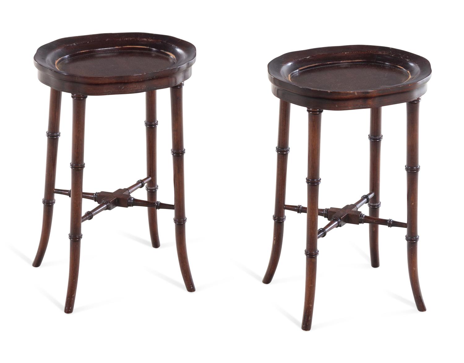 A Pair of Chinese Export Porcelain Armorial Platters Raised on Later Mahogany Stands