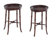 A Pair of Chinese Export Porcelain Armorial Platters Raised on Later Mahogany Stands