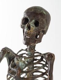 A Bronze Skeleton Figure Height overall 58 1/2 inches. — 20TH CENTURY