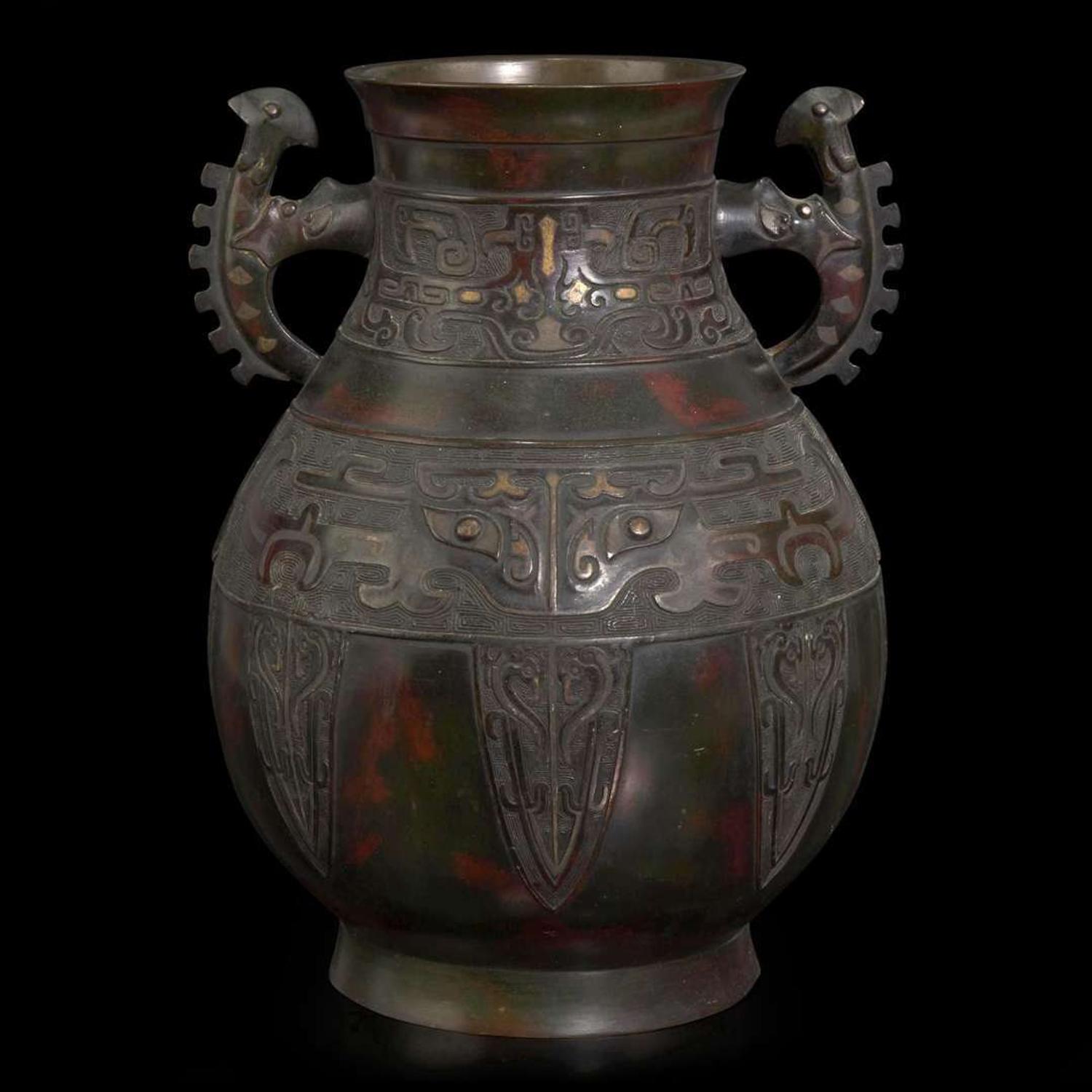 A large archaistic inlaid and patinated bronze "Hu"-form vase 镶嵌仿古铜壶樽