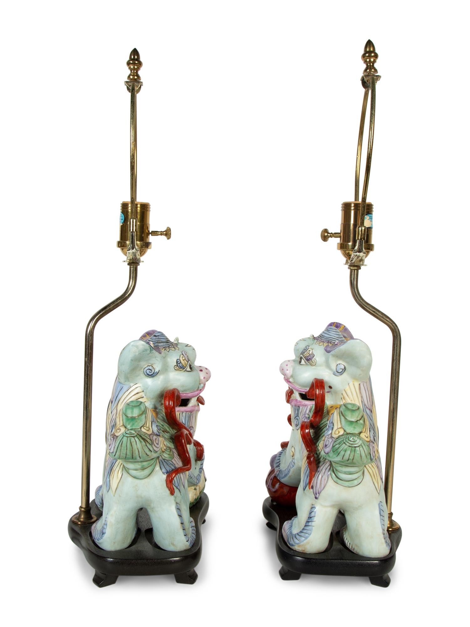 A Pair of Chinese Export Porcelain Buddhistic Lions Mounted as Lamps