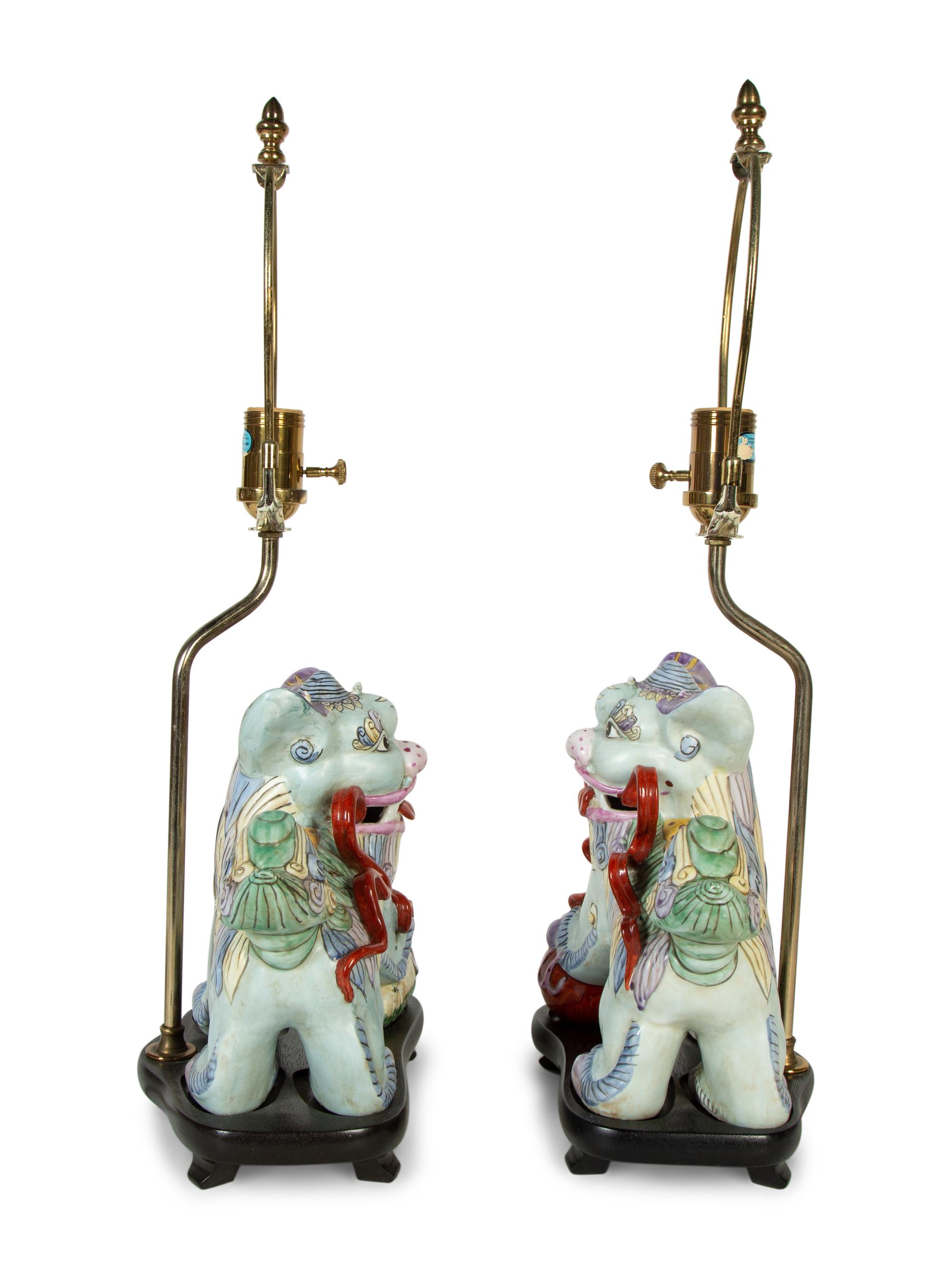 A Pair of Chinese Export Porcelain Buddhistic Lions Mounted as Lamps