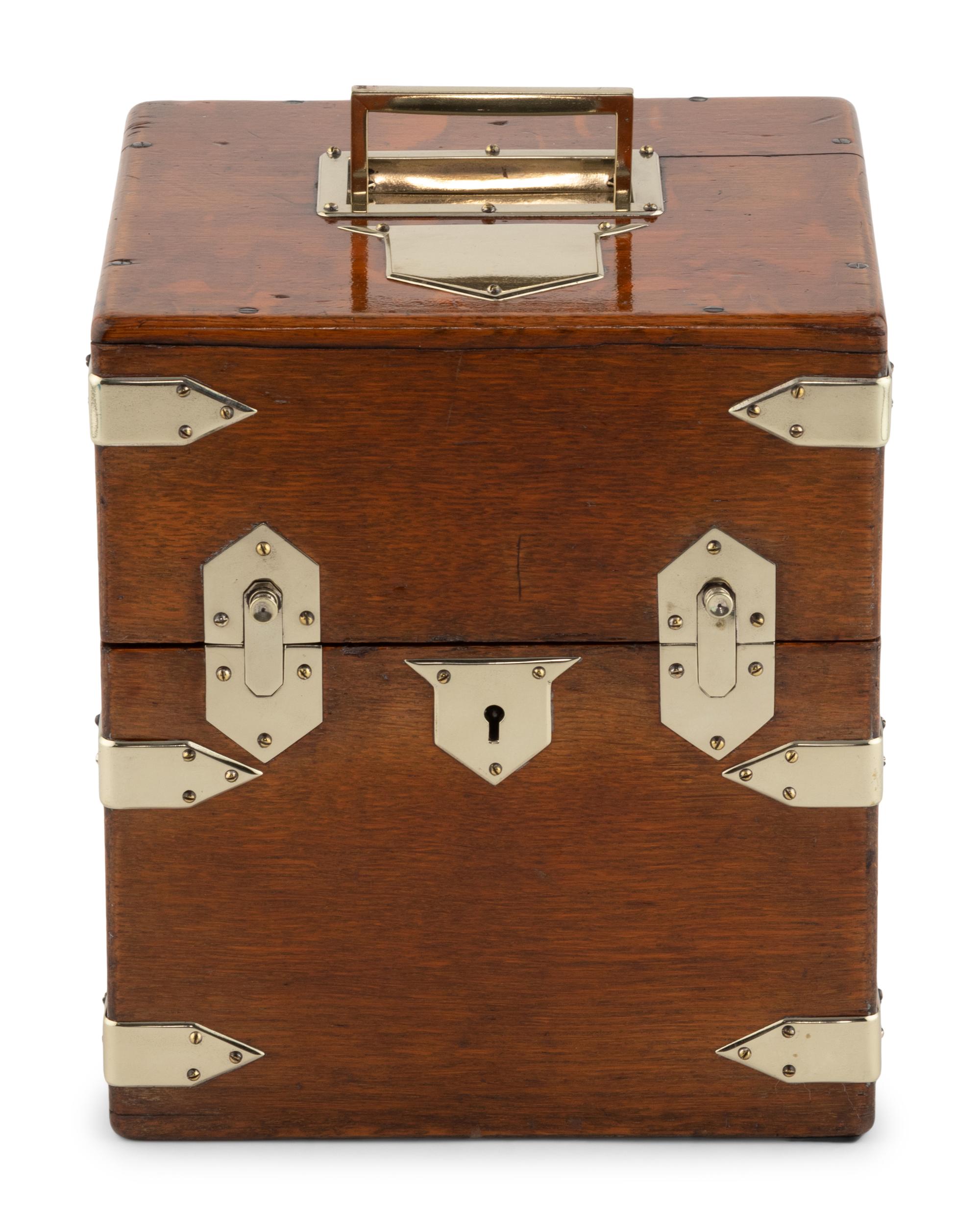 An English Mahogany Cased Four-Bottle Decanter Set