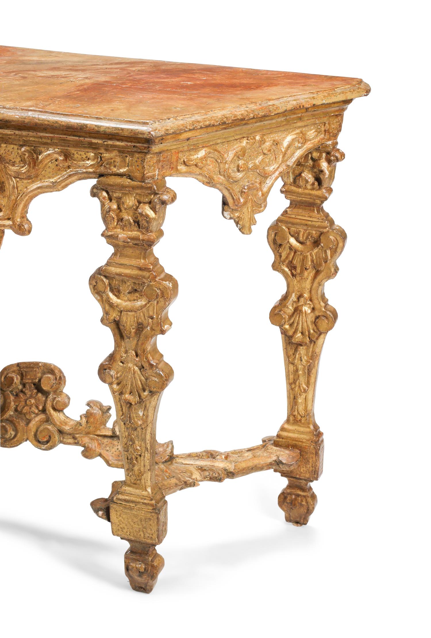 A Pair of Italian Baroque Carved Giltwood Console Tables