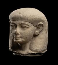 An Egyptian Limestone Canopic Jar Lid for Imseti