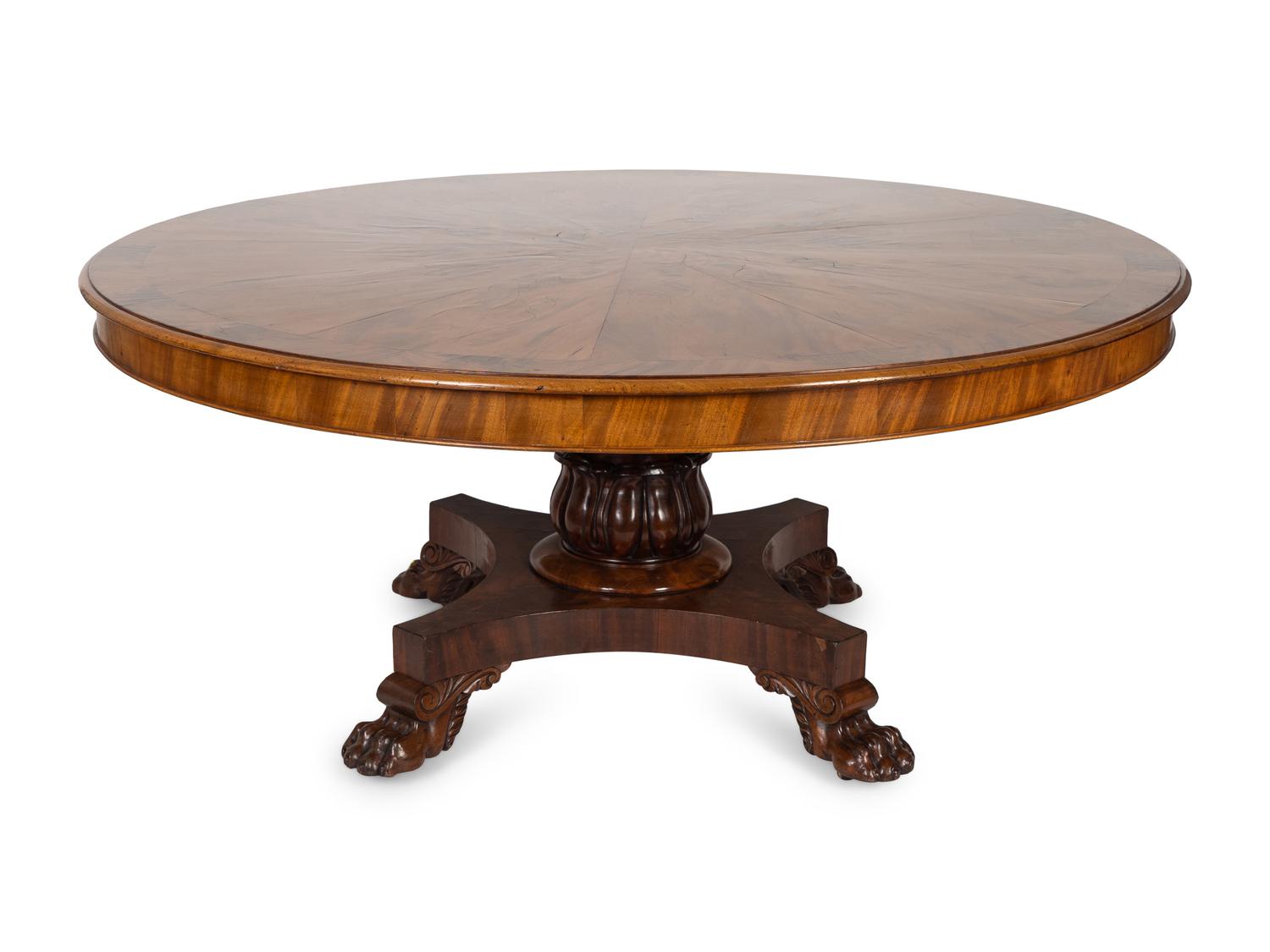 A Regency Crotch Mahogany Sunburst Inlaid Center Table — 19TH CENTURY