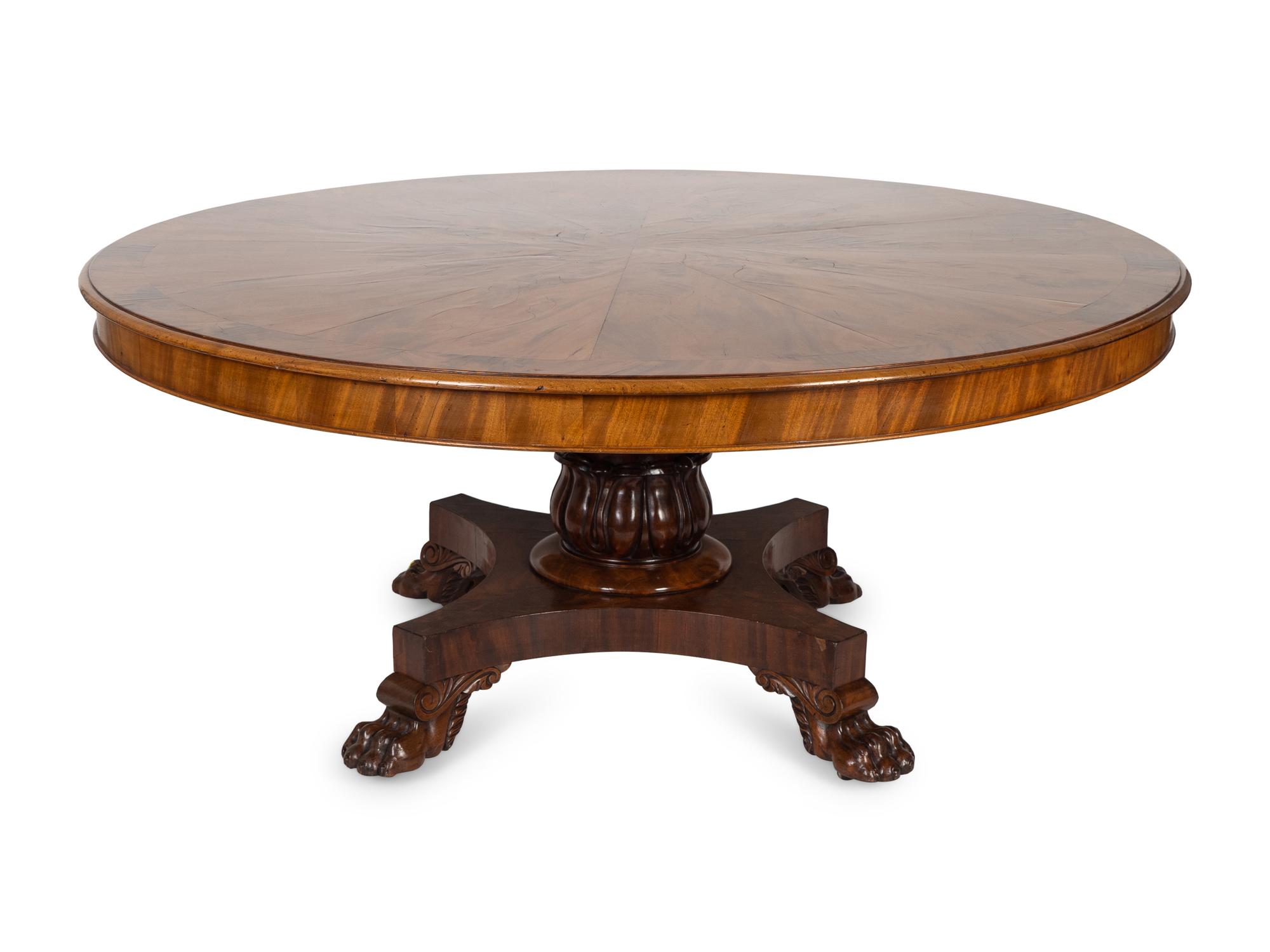 A Regency Crotch Mahogany Sunburst Inlaid Center Table — 19TH CENTURY
