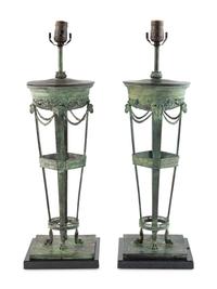 A Pair of Patinated Cast Metal Athéniennes Mounted as Lamps