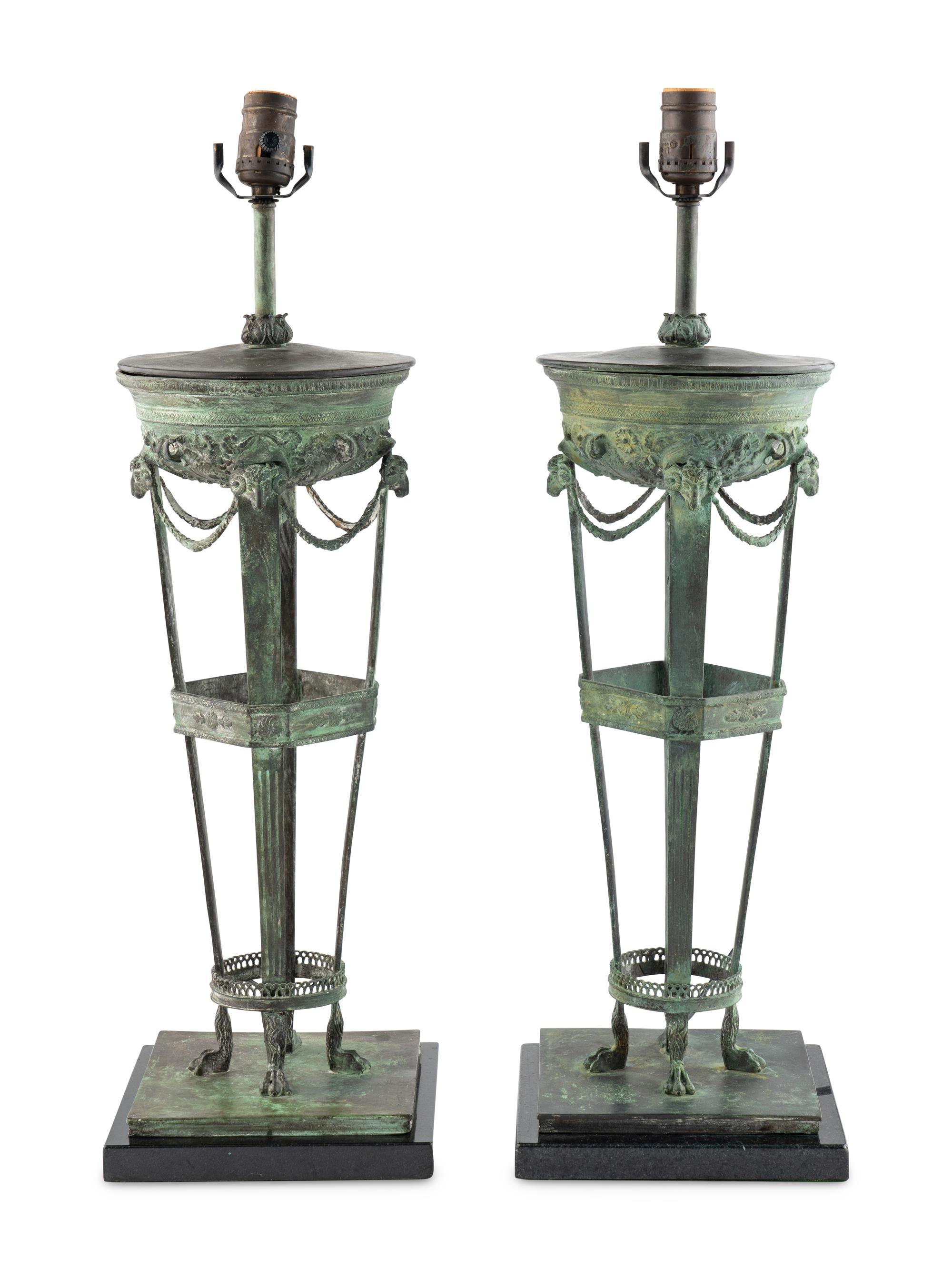 A Pair of Patinated Cast Metal Athéniennes Mounted as Lamps