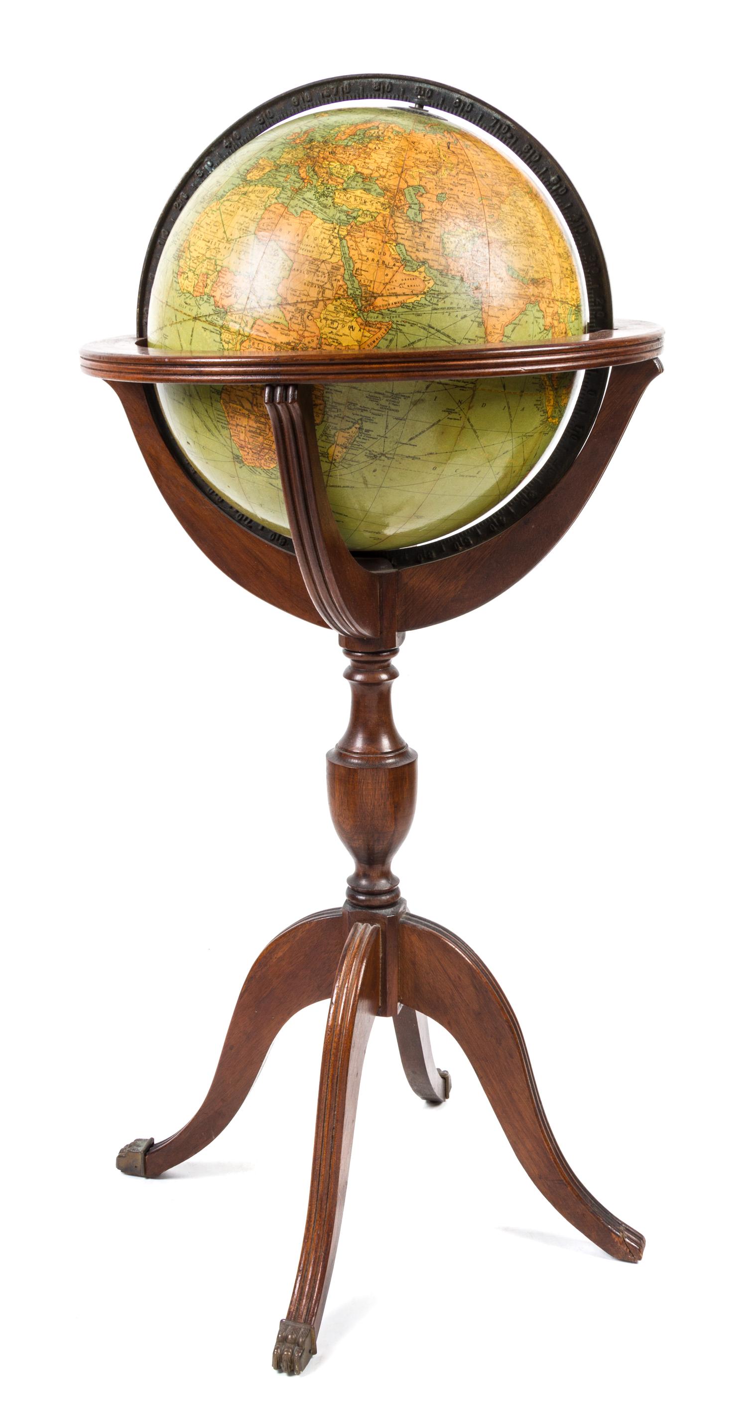 A Replogle Twelve Inch Library Globe Diameter of globe 12 inches, height overall 34 1/4 inches.
